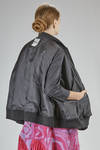 wide bomber jacket in polyester-padded nylon twill with parts in acrylic and wool knit - NOIR KEI NINOMIYA 