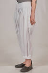 wide trousers in washed cotton and linen canvas, staggered high waist with raw cut profiles, rear central strap, pleats sewn on the front at the belt, diagonal welt pockets on the sides - MARC LE BIHAN 